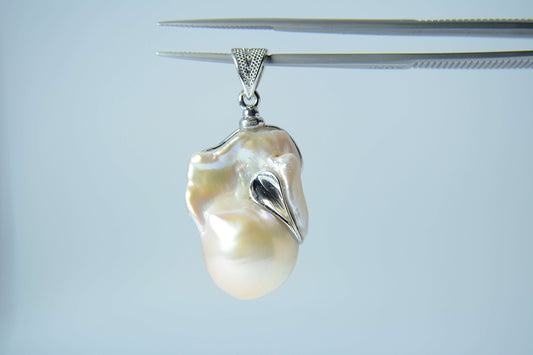 Pearl Pendant-Freshwater Peachy white Baroque with a Blue Topaz