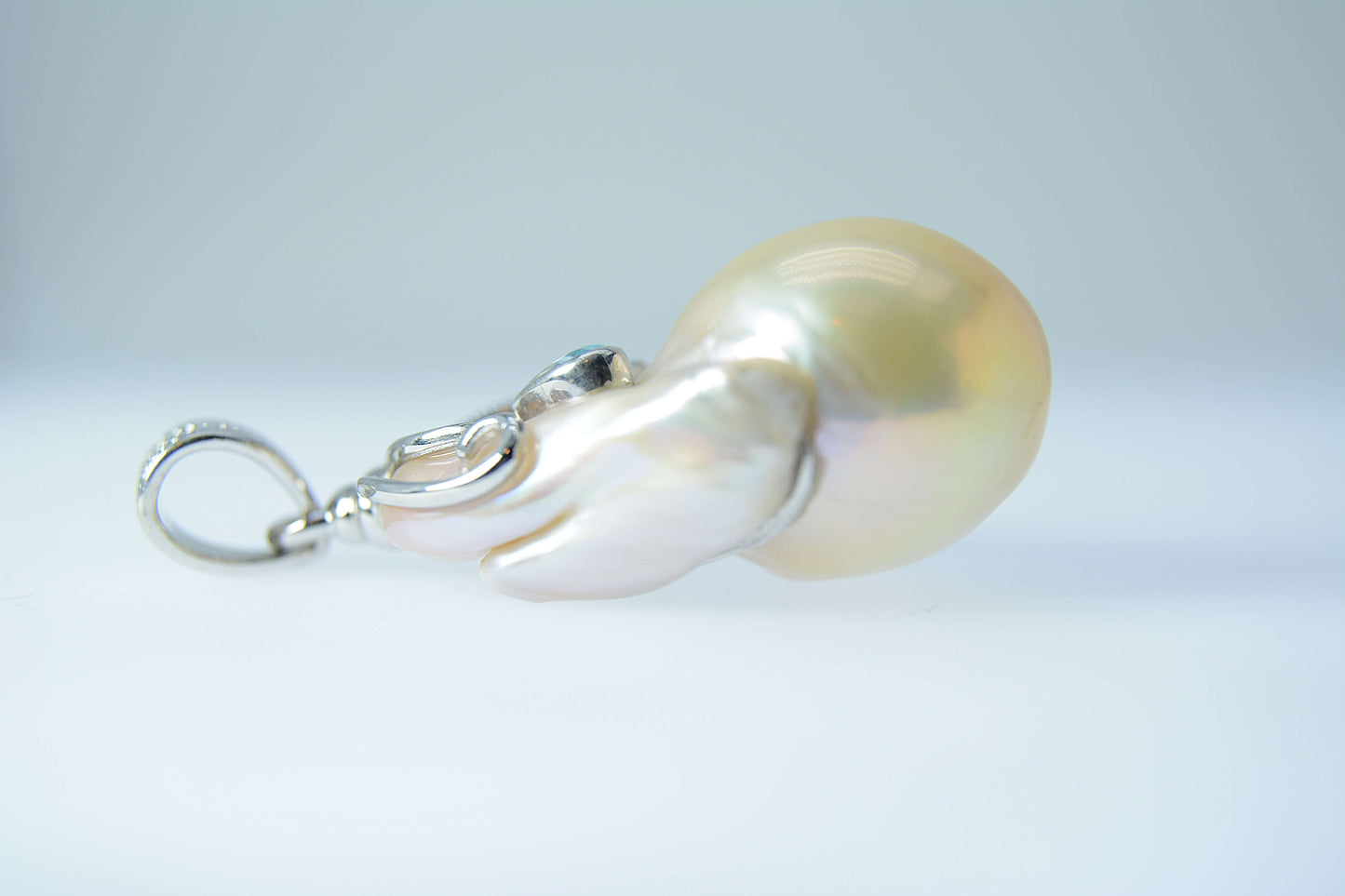 Pearl Pendant-Freshwater Peachy white Baroque with a Blue Topaz